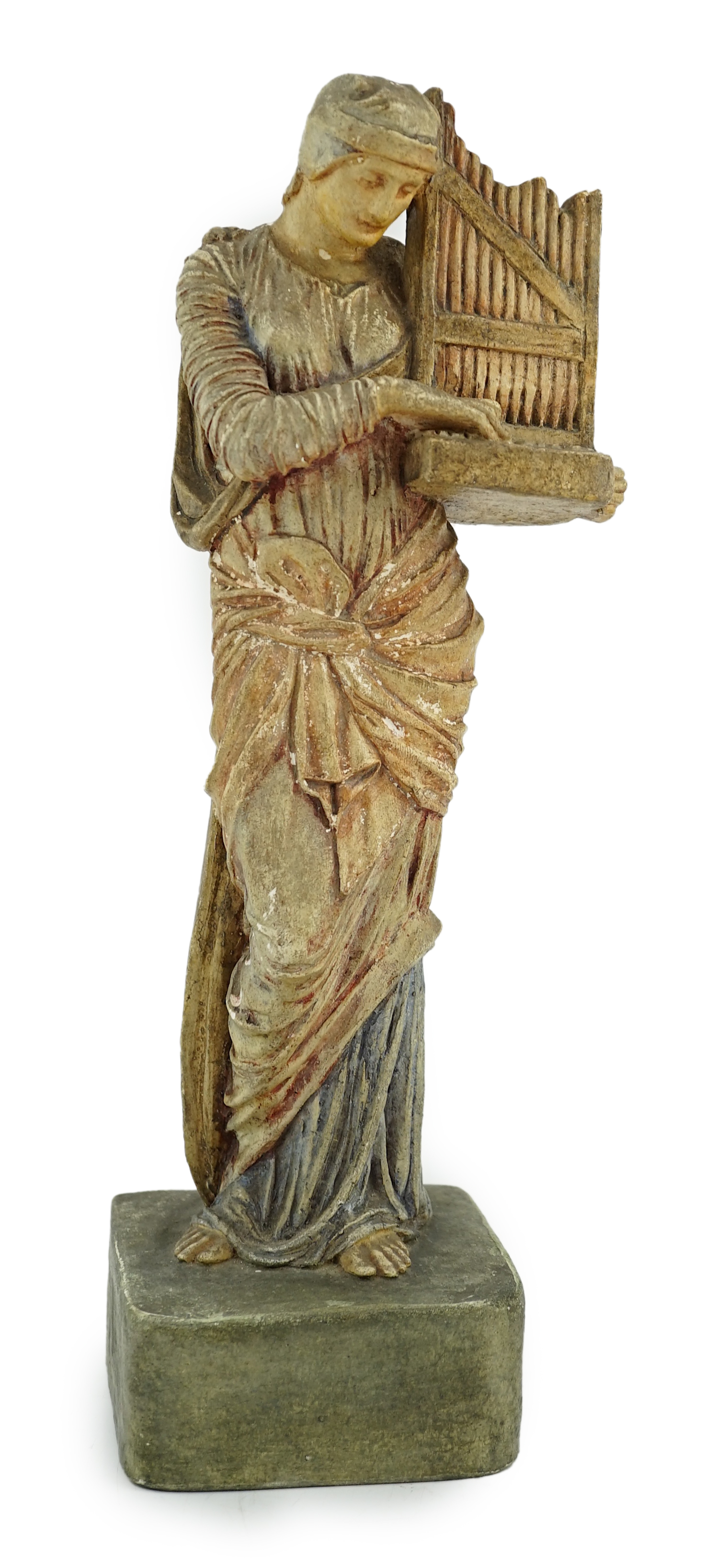A Compton tempera painted pottery figure of St Cecilia, early 20th century, losses to paint